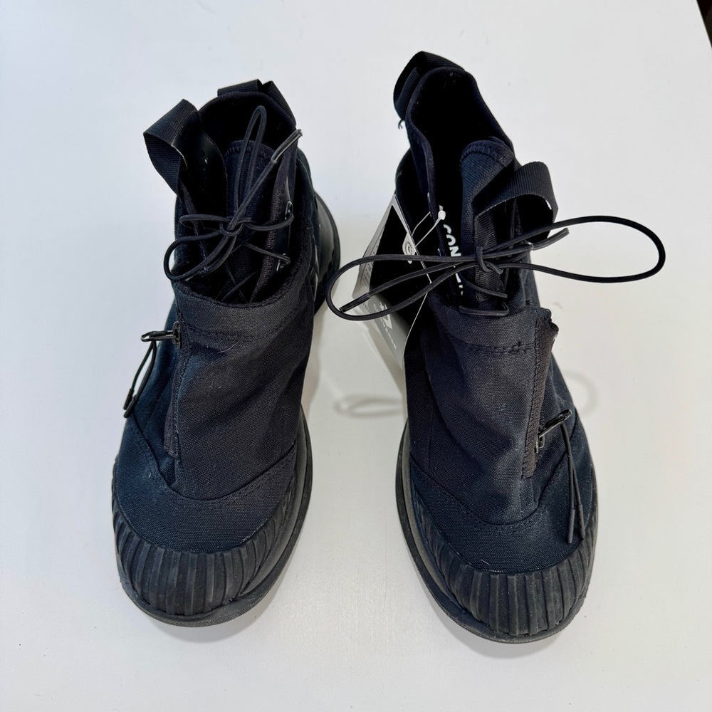 Converse Black High-Top Sneakers with double sock enclosure.